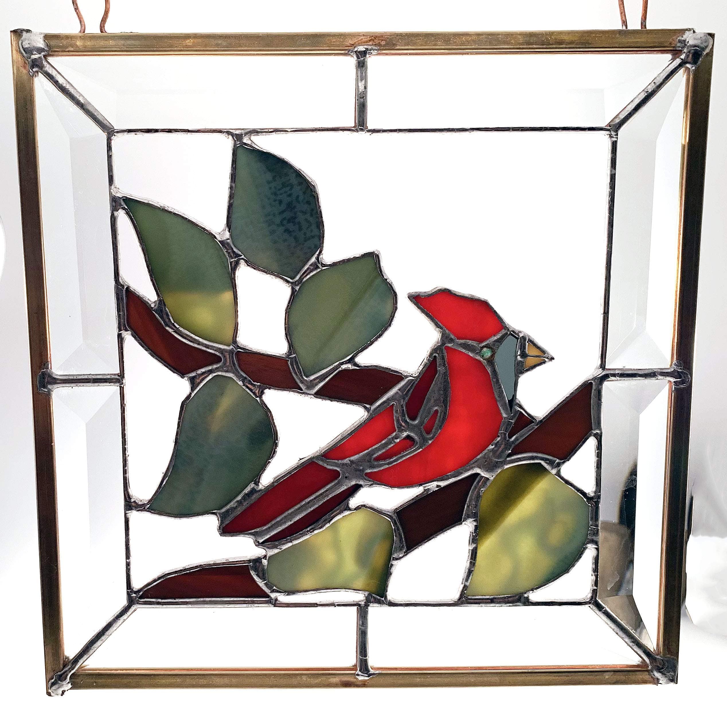 Red Cardinal Panel Surrounded by Beveled Glass, Framed in a Brass Covered Lead Frame