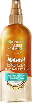 Garnier Ambre Solaire Natural Bronzer Self Tan Dry Oil 150ml,2-in-1 Oil Enriched With Coconut Oil,Nourishes Skin & Leaves A Luminous Fake Tan,Natural Streak-Free Result,Lasts Upto 1 week,Vegan Formula